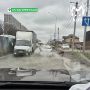 Речка-вонючка снова омывает дорогу на Батуринской в Краснодаре