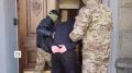 ФСБ показала кадры задержания мужчины, который собирал и передавал сведения о военных объектах и критической инфраструктуре Краснодарского края