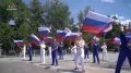 Космонавты «Роскосмоса» с борта МКС поздравили россиян с Днём государственного флага